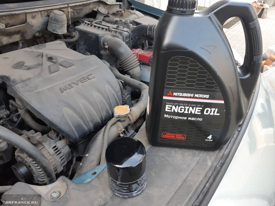 Какое масло лить в двигатель митсубиси лансер 9 1.6 литра