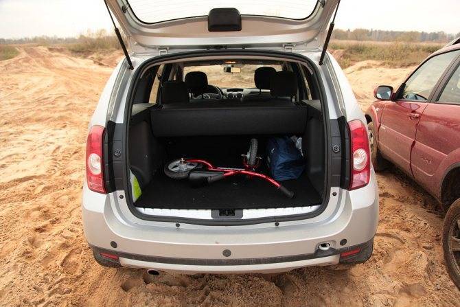 Какой на рено дастер багажник: объем в литрах